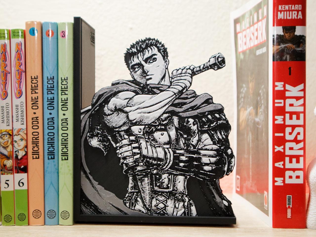 Guts Black Swordsman Resolve Bookend – Berserk