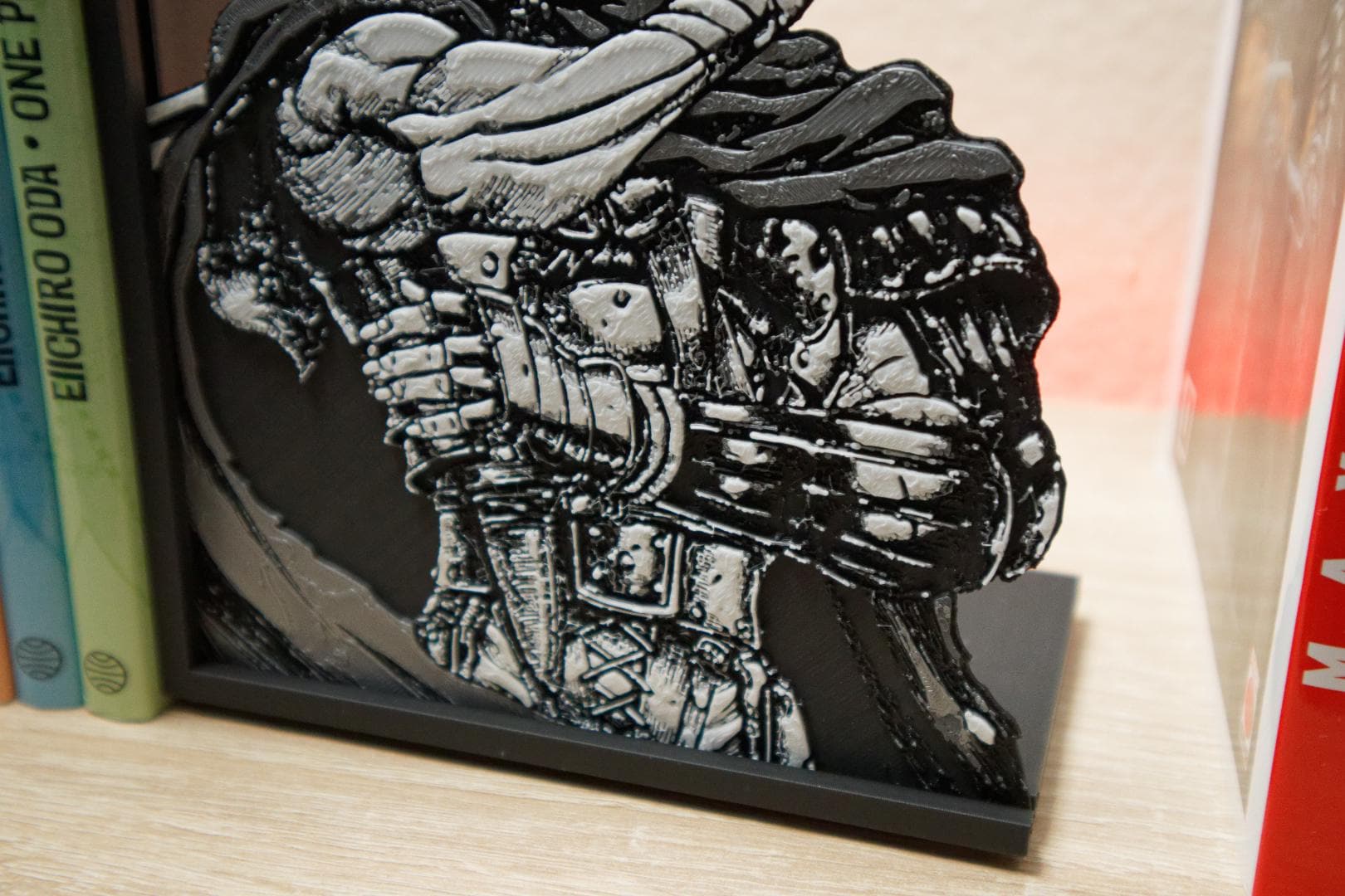 Guts Black Swordsman Resolve Bookend – Berserk